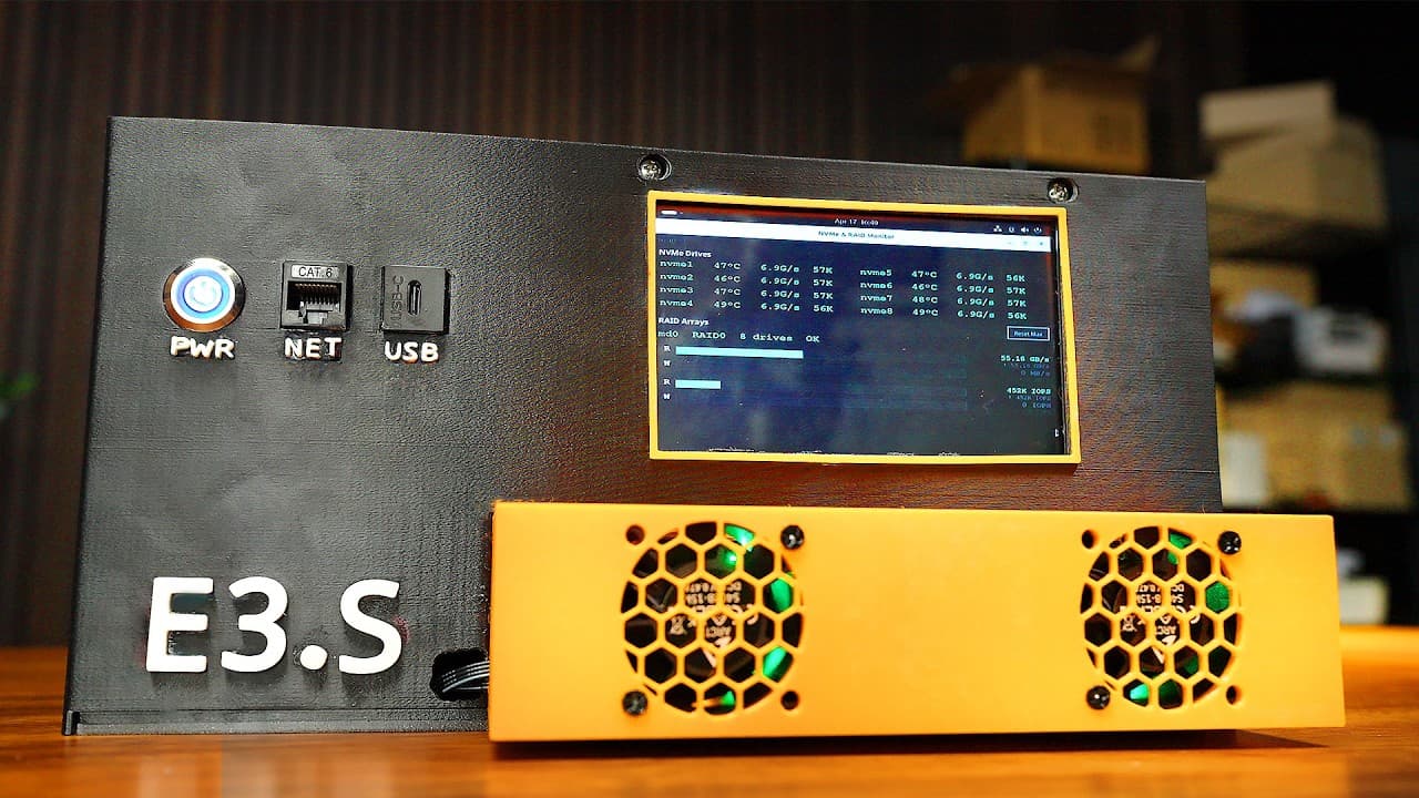 Custom-built NAS server labeled E3.S with dual yellow cooling units and monitoring display showing drive temperatures and…