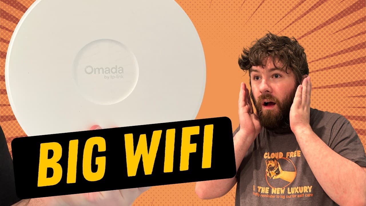 Excited man gestures toward a white Omada WiFi access point against an orange starburst background with bold yellow "BIG…